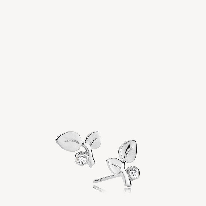 Amber ørestikker i sølv med hvide kubiske zirkonia og blomsterbladdesign fra Izabel Camille.
